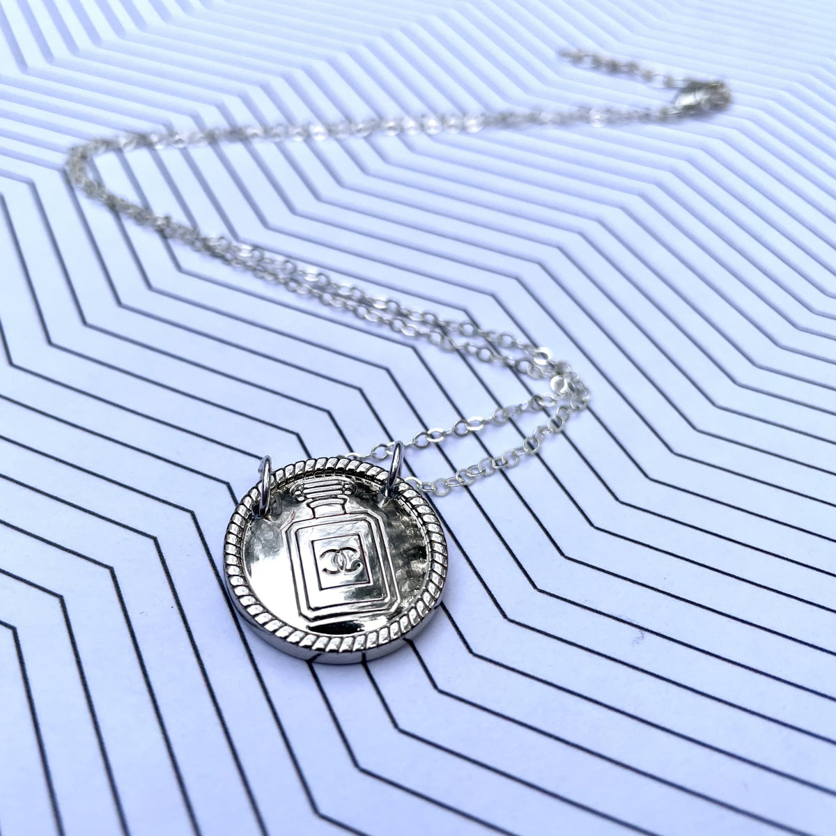 Chanel Perfume Bottle Round Silver Button Necklace – Vintage Vogue Lux
