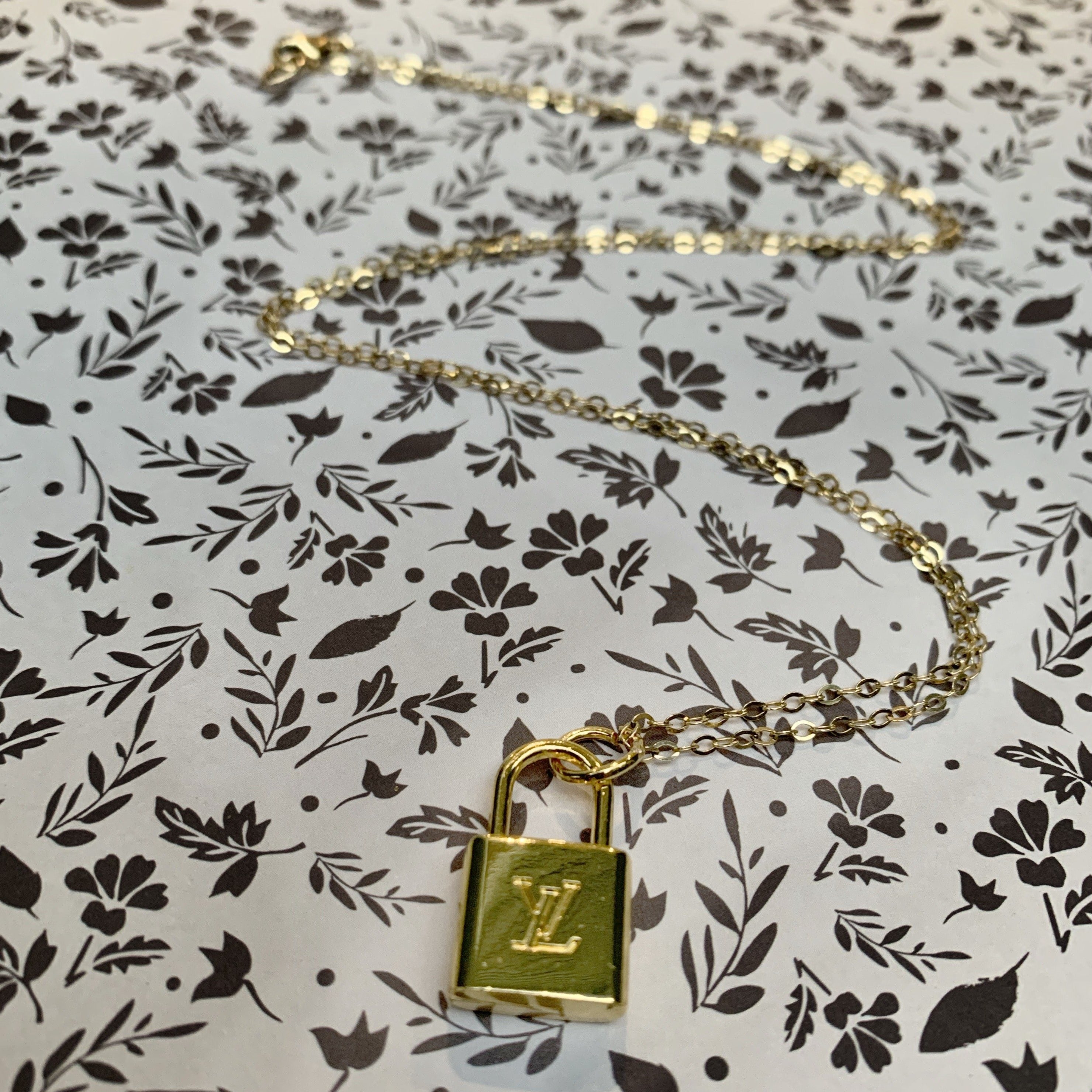 Silver Louis Vuitton Lock Necklace – Vintage Vogue Lux